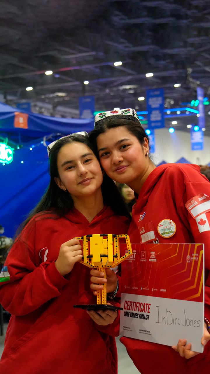 Handing over the new campus site.